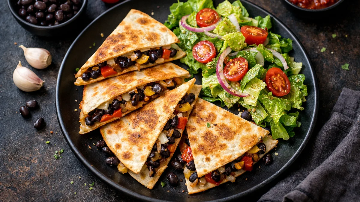 Black Bean & Charred Bell Pepper Quesadillas with Caramelized Onion and Crisp Romaine Salad